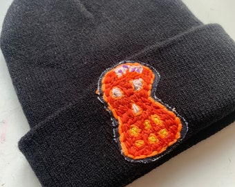 Droopy orange skull hand embroidered black beanie hat [DIY Tattoo Punk]