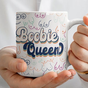 Funny mug for breastfeeding moms, lactation consultants that says “Bobbie Queen” & features lots of different cartoon breasts in tasteful retro design