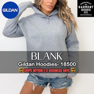 May include: A gray hooded sweatshirt with a drawstring hood. The sweatshirt is blank and ready to be customized. The text "GILDAN" is visible in the top left corner of the image. The text "BLANK Gildan Hoodies-18500 ups SHIPS WITHIN 1-2 BUSINESS DAYS ups" is visible at the bottom of the image.