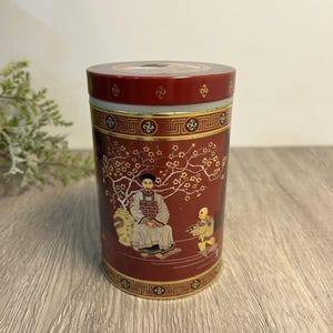 Scatola da tè rotonda in metallo vintage asiatico con tappo a vite e rivestimento in plastica, rosso, nero e oro