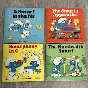 Smurfen miniverhalenboeken van Peyo Set van 4 paperback 1980 1982 Smurf in de lucht