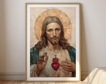May include: Framed print of a religious figure with long brown hair and a beard, wearing a white tunic and blue robe. A red heart with a cross is on the chest. A golden halo surrounds the head. The artwork is displayed in a wooden frame.
