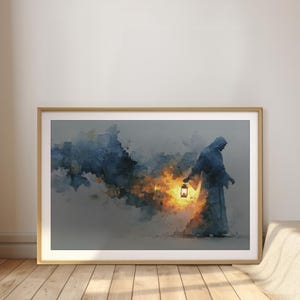 Peut inclure: Impression d'art encadrée représentant une figure en robe à capuche tenant une lanterne. L'œuvre est de style aquarelle, avec des bleus, des oranges et des gris. La figure marche vers la droite, avec une lumière vive émanant de la lanterne.