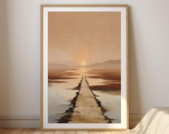 May include: A framed landscape art print depicting a pathway leading to a sunset. The artwork features a warm color palette of browns, oranges, and yellows, with mountains in the background. The print is displayed in a light brown wooden frame.