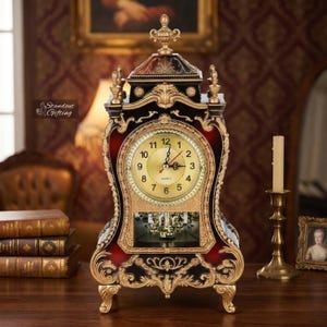 May include: An ornate, antique-style quartz clock with a gold-tone face and hands. The clock features a black and red frame with gold accents and decorative carvings. The clock sits on four gold feet and has a pendulum visible through a glass window.