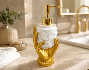 Dispenser di sapone liquido dorato in resina, flacone con pompetta per lozione da dito dal design creativo, dispenser di sapone di lusso per l'arredamento del bagno, accessorio moderno per lavabo.