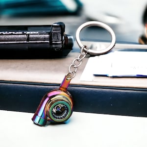 Men air blower charm keychain