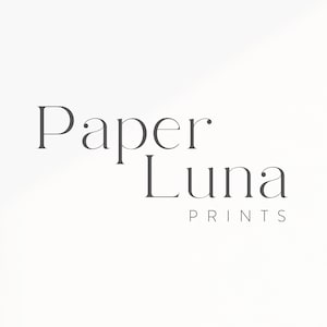 May include: A logo for a company called "Paper Luna Prints". The logo is in a minimalist style with the text in a simple, sans-serif font.