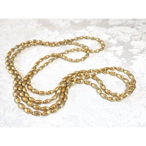 Vintage veelzijdige ketting met operalengte en getextureerde glaskralen Klassiek chic