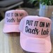 IVORY/CAMO HAT - PUT IT ON MY DAD'S TAB
