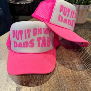 'PUT IT ON MY DAD'S TAB' Trucker Hat
