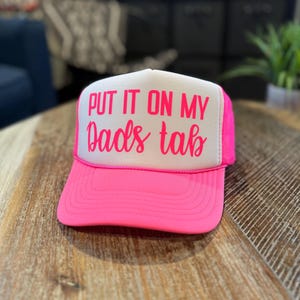 Put it on my Dads Tab Trucker Hat