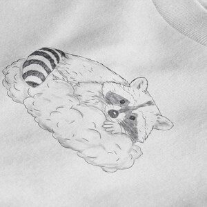 Schlurpi the Sleeping Raccoon – Unisex T-Shirt | Sustainable Cotton Shirt with Hand-Drawn Illustration