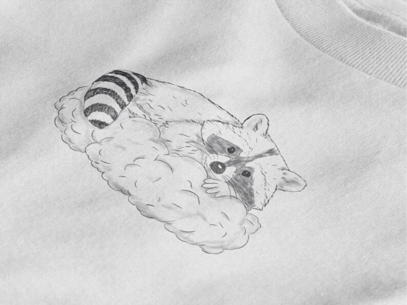 Schlurpi the Sleeping Raccoon – Unisex T-Shirt | Sustainable Cotton Shirt with Hand-Drawn Illustration