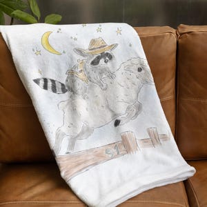 Cozy Plush Blanket with Schlurpi the Raccoon Riding a Sheep | Perfect Gift for Raccoon Fans | 50x60" (127x152 cm)