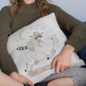 Square Pillow with Schlurpi the Raccoon Riding a Sheep | Perfect Gift for Raccoon Fans