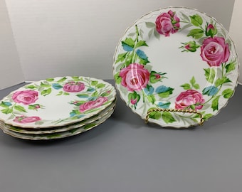 Set van 4 Dresden-saladeborden met roze rozen, porseleinen geschulpte diameter, bloemen in reliëf, gouden en witte randen, verkocht bij Jaccard's