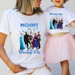 May include: White t-shirts with matching graphics featuring characters from a popular animated film. One shirt says "Mommy of the Birthday Girl" and the other says "Birthday Girl" with the number 5. The child is wearing a pink tutu.