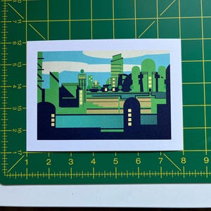 « Impression carte postale dynamique Green City Metropolis » par Khasmworks