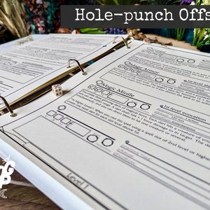 May include: A close-up of a binder with pages containing a Dungeons and Dragons character sheet template. The template includes sections for "Create", "Mage Armor", and "Magic Missile". The text "Hole-punch Offset" is printed at the top of the page.