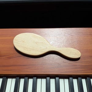 May include: A rustic wooden sign with the text "Welcome to our home" in a handwritten style. The sign features a distressed finish and a simple, inviting design, perfect for a front porch or entryway.