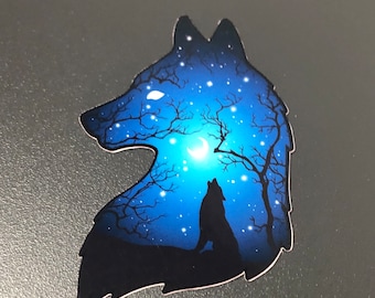 May include: A blue and black wolf silhouette with a crescent moon and stars in the background. The wolf is howling at the moon.