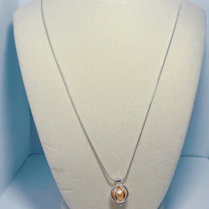 Silver Necklace With Fresh Water Pearl Inside