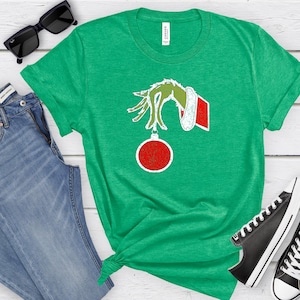 Grinch Holding Ornament Tshirt | Funny Grinch T-shirts | Christmas Grinch Shirt | Christmas Movie Grinch Shirt | Funny Christmas Apparel