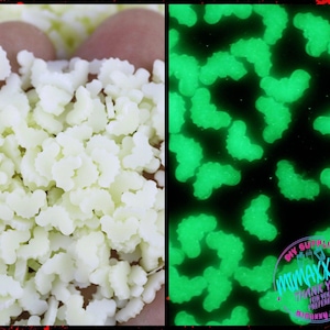 May include: White glow-in-the-dark sprinkles in a pile. The sprinkles are shaped like small, irregular stars. The image on the right shows the sprinkles glowing green in the dark.