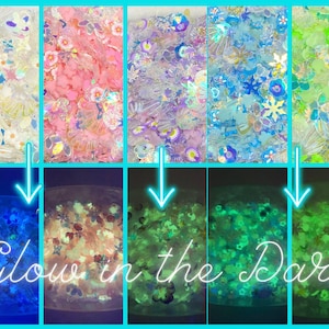 May include: Six jars of iridescent glitter, each with a different color and design. The jars are arranged in a row, and the glitter is visible in both natural and blacklight. The text "Glow in the Dark" is written in white on a black background.