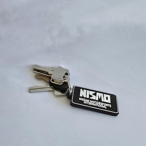 JDM Style Keychain – Car Enthusiast Gift Rectangular Keyring, Inspired by Heritage NISMO Logos
