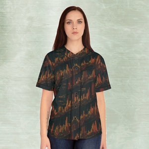 May include: A black baseball jersey with a colourful abstract pattern of lines and shapes. The pattern resembles a stock market chart.
