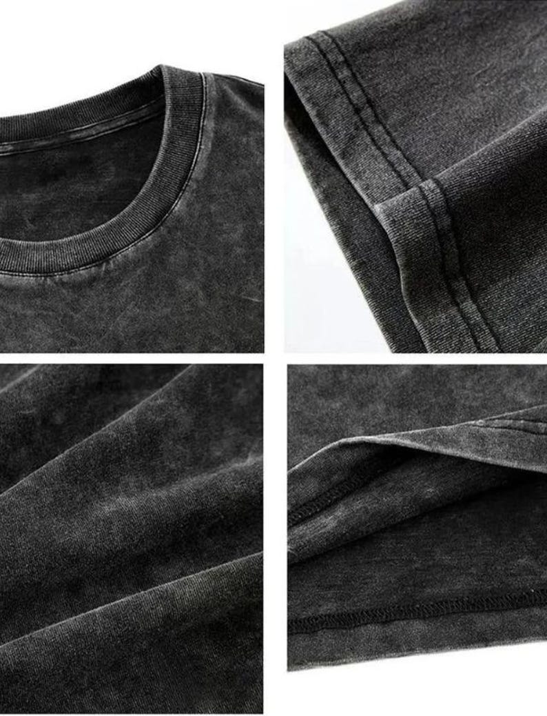 May include: Close-up shots of a dark gray, acid-washed t-shirt. The images highlight the texture and details of the fabric, including the neckline, seams, and overall distressed appearance. The shirt appears to be made of a soft, comfortable material.