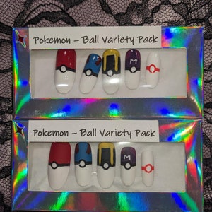 May include: Two boxes of Pokemon Ball Variety Pack press-on nails. Each box contains six nails with different Pokemon ball designs. The designs include a red and white Pokeball, a blue and white Pokeball, a yellow and black Pokeball, a purple and black Pokeball, and a red and white Pokeball with a red ring.