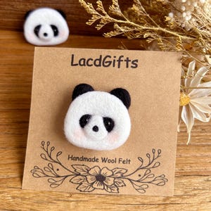 A cute panda, handmade wool felt panda brooch, perfect as a gift for backpacks and clothing.