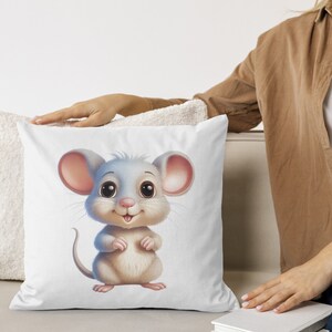 May include: White throw pillow with a cartoon illustration of a smiling gray mouse with pink ears and a white belly.