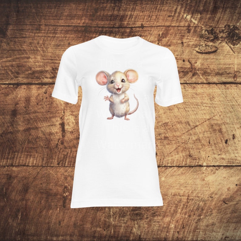 May include: White t-shirt with a cartoon image of a smiling mouse with large ears.