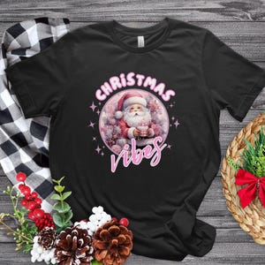 Christmas Vibes Santa T-Shirt High Quality Funny Unisex T-Shirt Pink Holiday Shirt Design Christmas Vacation Tee Cute Pink Santa Shirt
