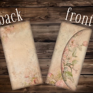 May include: Two vintage-style paper envelopes with a floral design. The front of one envelope features a curved flap adorned with pink roses and green leaves. The back of the other envelope is plain. The word "back" and "front" are written on the image.