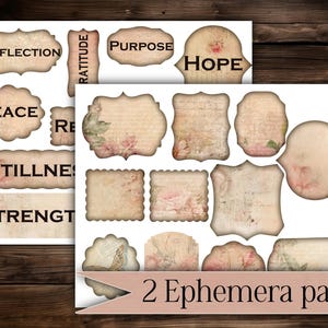 May include: Two pages of ephemera with vintage-style designs. The first page features labels with words like "Reflection" and "Peace." The second page has various shapes with floral and script details. The words "2 Ephemera pages" are at the bottom.