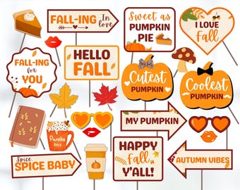 May include: A set of 12 fall-themed photo booth props featuring various designs, including pumpkins, leaves, and text. The props are printed on cardstock and have sticks attached to the back. The text on the props includes "Fall-ing in love", "Hello Fall", "Sweet as Pumpkin Pie", "I Love Fall", "Cutest Pumpkin", "Coolest Pumpkin", "My Pumpkin", "Happy Fall Y'all", "Spice Baby", and "Autumn Vibes".