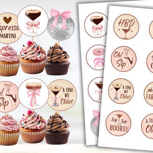 May include: A set of 12 cupcake toppers featuring a pink and brown color scheme with various designs including martini glasses, disco balls, and text such as "Espresso Martini", "Oh! Sip", "A Tini Bit Older", "HBD", "Sassy & Classy", "Absolutely Fabulous", and "Sip Sip Hooray".