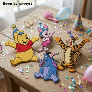 May include: Four embroidered fabric patches featuring Winnie the Pooh, Piglet, Tigger, and Eeyore, each wearing a colourful party hat. The characters are depicted in their classic colours of yellow, pink, orange with black stripes, and blue.