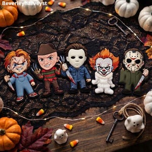 May include: Five horror movie character patches featuring Chucky, Freddy Krueger with a clawed glove, Michael Myers with a knife, Pennywise the clown, and Jason Voorhees with a hockey mask and machete, all rendered in a stylized, cartoonish aesthetic.