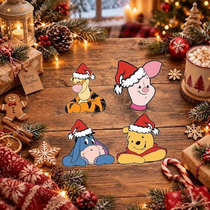 May include: Four stickers featuring Tigger, Piglet, Eeyore, and Winnie the Pooh, each wearing a red and white Santa hat. The characters are arranged on a wooden surface surrounded by Christmas decorations including a gingerbread man and gifts.
