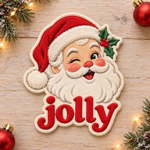 May include: An embroidered patch featuring a winking Santa Claus wearing a red hat with white trim and a sprig of green holly with red berries. Below the face, the word jolly is stitched in bold red lowercase letters with white borders.