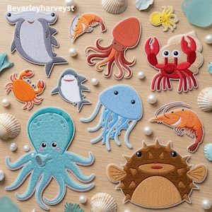 May include: A collection of embroidered sea creature patches including a gray hammerhead shark, orange shrimp, red octopus, red crab in a shell, gray shark, blue jellyfish, teal octopus, and a brown pufferfish, with the text Beverleyharveyst.
