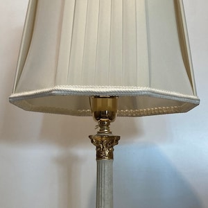 Terracotta lamp with Corinthian column, travertine decoration and silk lampshade