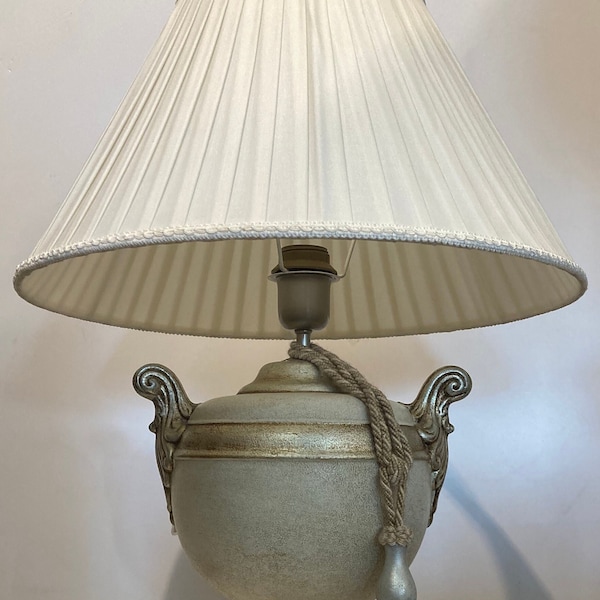 Lamp with travertine decoration and platinum edge