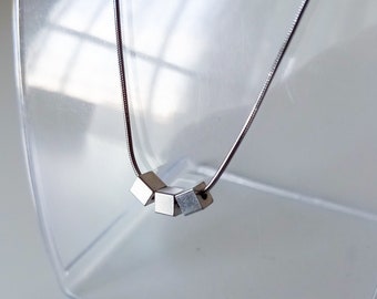 Minimalist silver stainless steel snake chain necklace with 3 cubes, affordable jewellery